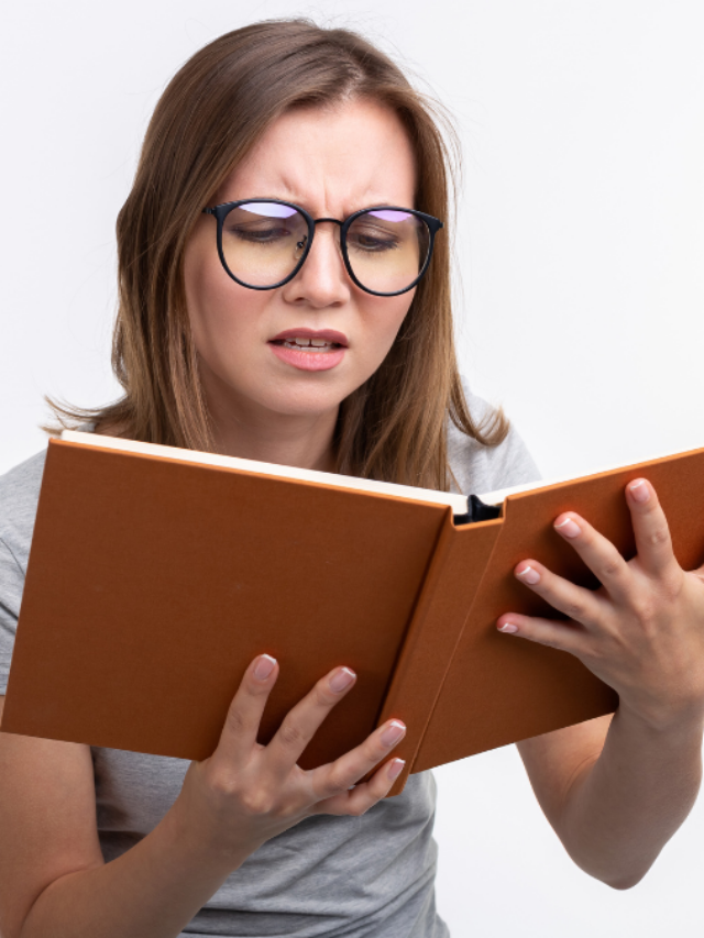 woman confused by book
