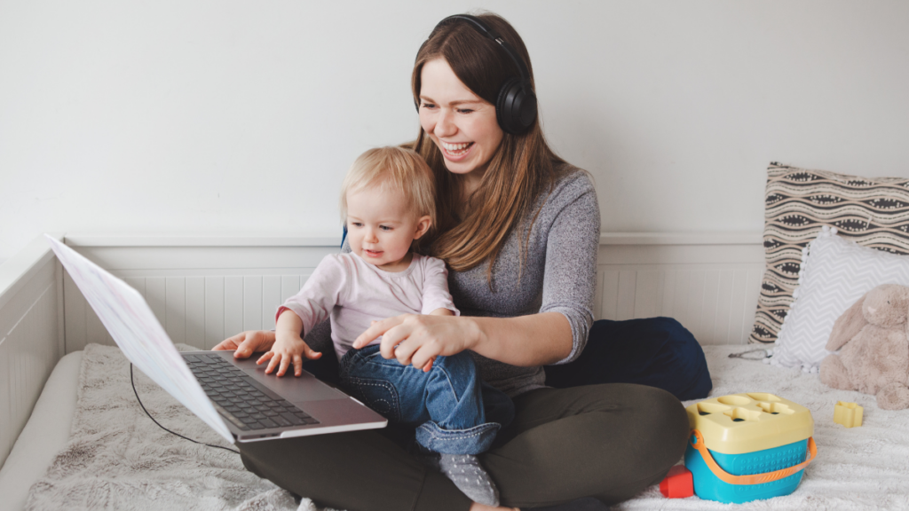 woman with baby and headphones