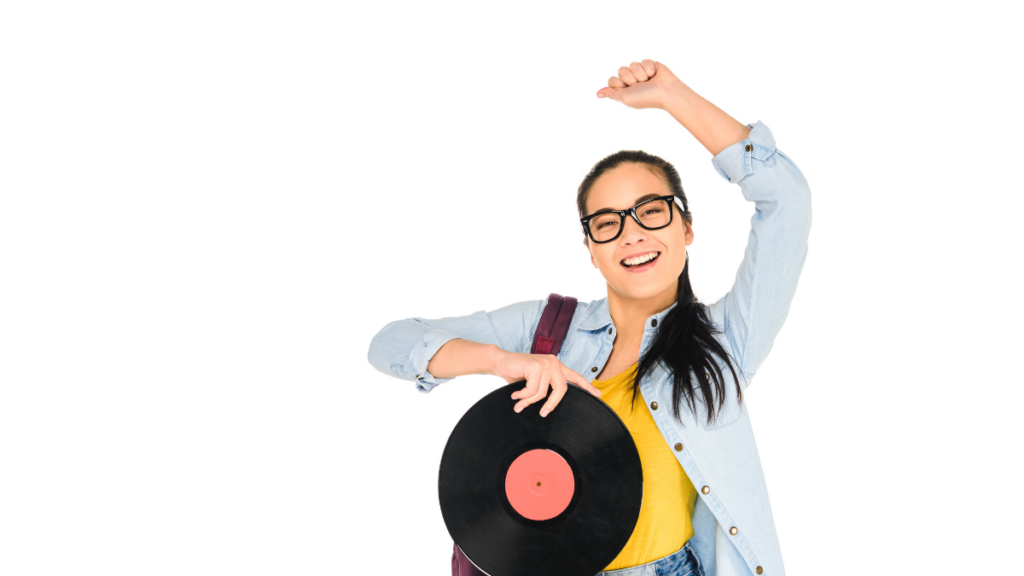 girl holding a record